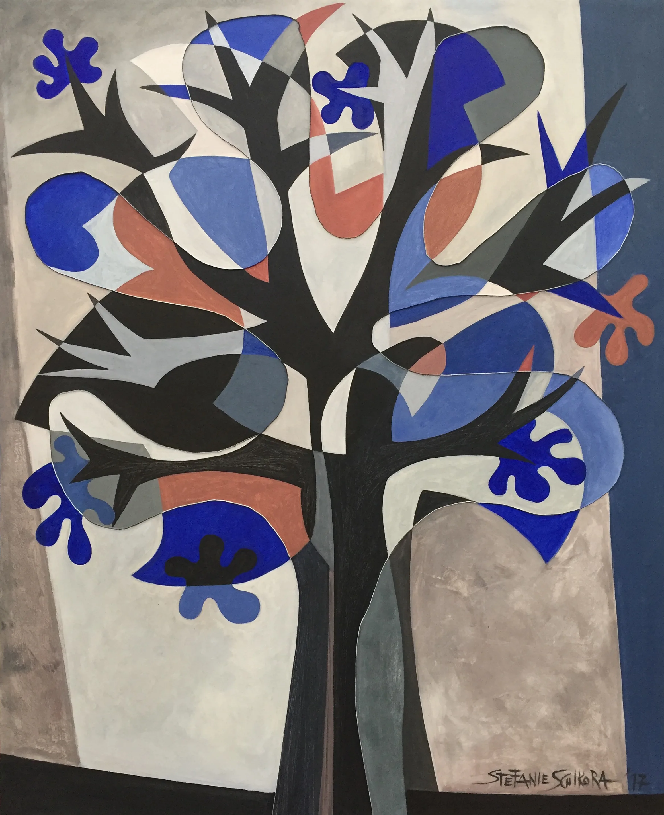Árbol entre azules y cafés